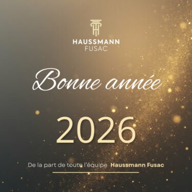 Carte de vœux Haussmann Fusac 2026 avec message "Bonne année" sur fond doré scintillant, logo en haut et signature de l’équipe en bas.